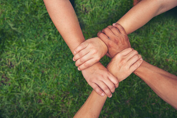 Diverse multiethnic Partners hands together teamwork group of multiracial people meeting join hands...