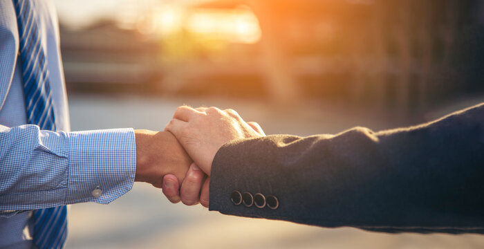Lawyer partnership Businessman handshake together Notary lawfirm. Two Men Trust honesty business customer handshake promise respect partner. Diversity solidarity team Partner hands together teamwork