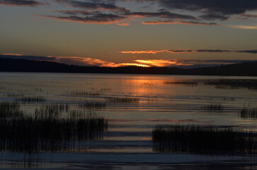 Fototapeta premium sunset over the lake