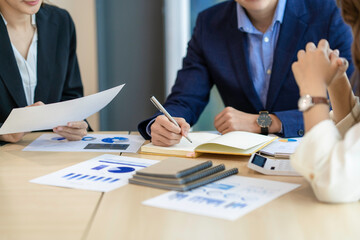 Asian Business people meeting time working with new startup project. Idea presentation, analyze plans. Business Discussing some business ideas. Teamwork concept.