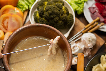 ingredients for bagna cauda sauce with cream and anchovies