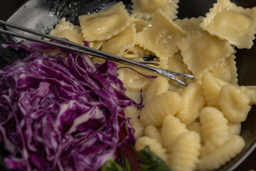ingredients for bagna cauda sauce with cream and anchovies