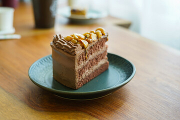 A slice of layered honey chocolate cake