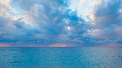 Dramatic thunder cloud over the turquoise sea at sunset - Alanya, Antalya