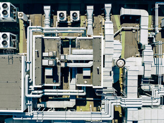 Air Condition Ventilation System on the Building Roof. Industrial Air system of ventilation and Air conditioning. Aerial Shot.