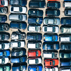 Fototapeta premium Abandoned Cars in Junkyard. Top Down View. Drone Photo. Vehicle Demolition.