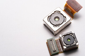 camera modules being used in mobile phones. development of mobile cameras. Digital camera lens...