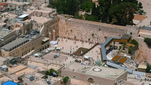 Aerial view over western wall or wailing wall, Jerusalem

Drone view  over the Kotel holly place for jewish people, June,2022

