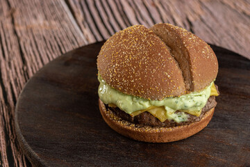 Hamburger - Snack with beef burger, green sauce, mozzarella cheese and fries