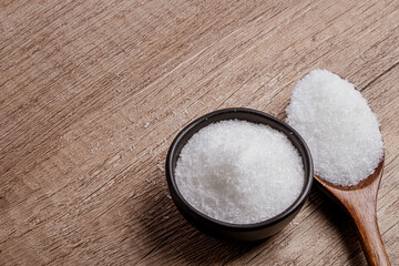 monosodium glutamate in a black cup