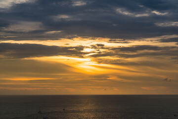 Fototapeta premium The sun is falling in sunset time at Promthep Cape in Phuket, Thailand.