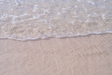 water waves bubbles on the beach