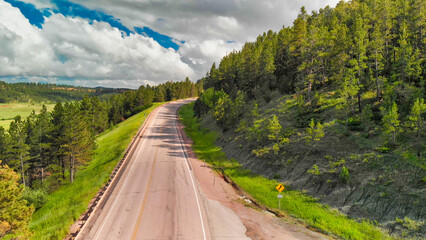 Obraz premium Aerial view of Devils Tower surrounding countryside in summer season, Wyoming