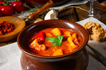 Hungarian goulash soup in a cauldron or pot