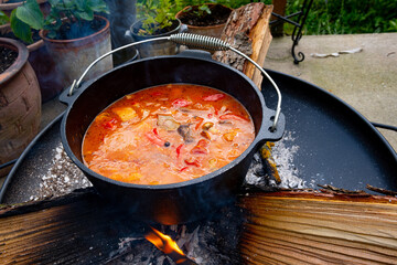 Kettle goulash is prepared over an open fire!