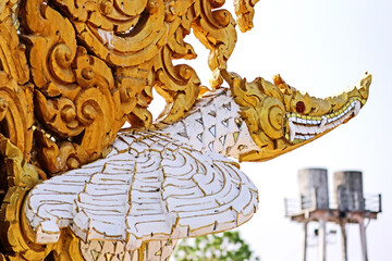 Traditional Thai style golden stucco in Thai temple
