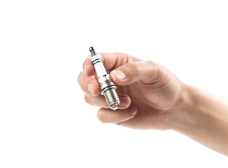 The hand holds a new iridium spark plug. Close up. Isolated on a white background