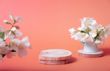 Natural minimal beauty wooden pedestal. Empty cosmetics podiums for product on red background with...
