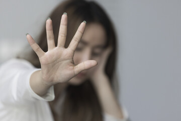 Stop violence against women concept woman raised her hand for dissuade, Stop sexual harassment.
