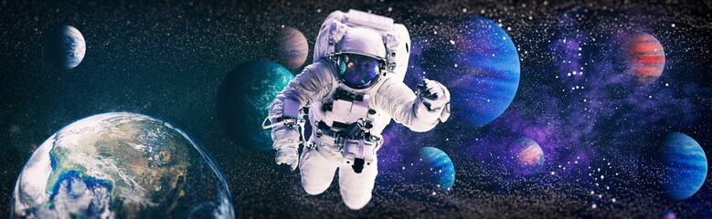 Astronaut in space in the solar system Earth. Blue light on background. Elements of this image...