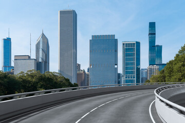 Empty urban asphalt road exterior with city buildings background. New modern highway concrete construction. Concept of way to success. Transportation logistic industry fast delivery. Chicago. USA.