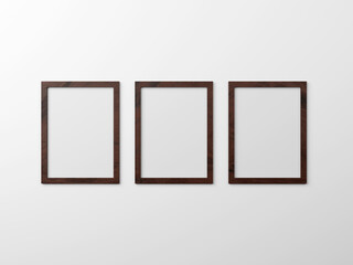 Vertical simple frame mockups. Three vertical dark wood Blank frame hanging on wall painted white color. Blank photo frame mockups for your design. 3d rendering illustration. 