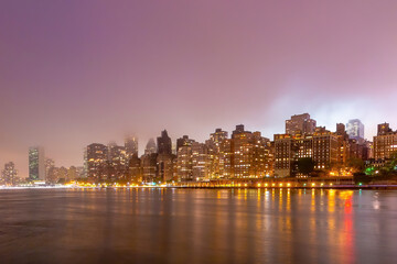 Obraz na płótnie Canvas Manhattan city skyline cityscape of New York with Queen Bridge