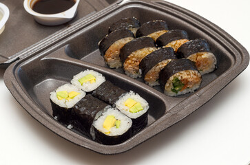 sushi set in a plastic bowl