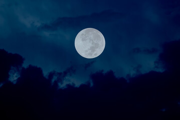Fototapeta na wymiar Full moon on sky in the dark night.