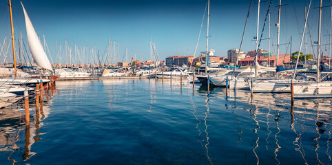 White yachts in Chioggia port. Calm summer seascape of Adriatic sea, Italy, Europe. Traveling concept background.
