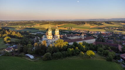 Monastary of Saint Florian (Sankt Florian) in upper Austria in the evening sun - aerial shot - obrazy, fototapety, plakaty