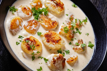 scallops with white wine cream sauce, top view
