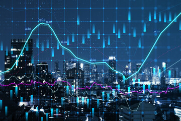 Abstract glowing forex graph on blurry night city wallpaper with candlestick. Invest, trade and...