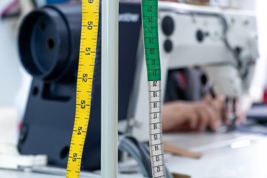Measuring tape near sewing machine