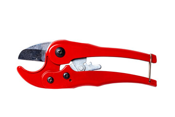 Plumber tools isolated. Closeup of a red PVC pipe cutter for cutting plastic pipes isolated on a white background. Clipping path. Macro. Craftsman tools. - obrazy, fototapety, plakaty
