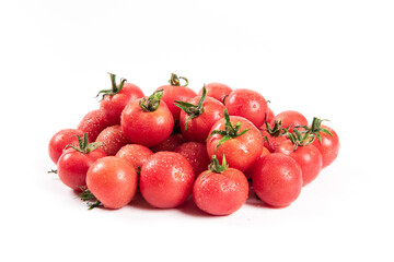 pile of cherry tomatoes isolated on white background.