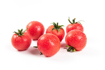 pile of cherry tomatoes isolated on white background.