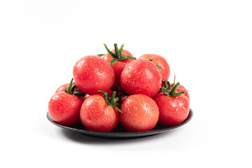 cherry tomatoes in plate isolated on white background.