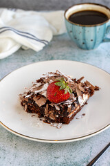 Chocolate cake. Cake with chocolate chips and chocolate sauce. close up