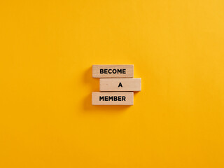The announcement message become a member on wooden blocks. membership and subscription