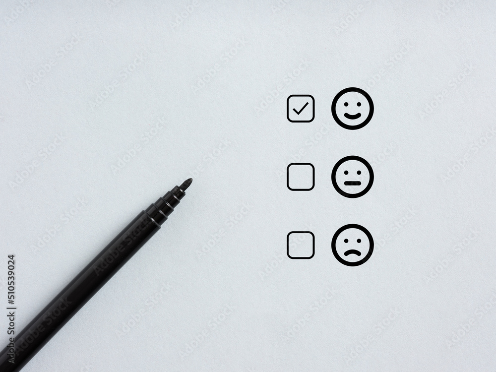 Poster tick placed in checkbox of selected happy emoticon. customer satisfaction and positive client feedba