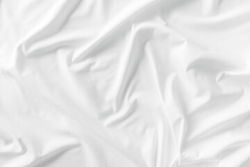 White fabric. luxurious white fabric texture background. Creases of satin, silk, and cotton.