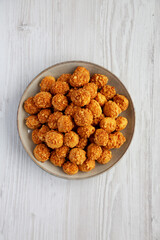 Homemade Crumbly Biscuits with Parmigiano Reggiano on a Plate, top view. Flat lay, overhead, from above.