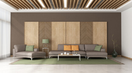 Large living room with sofa against wooden panel