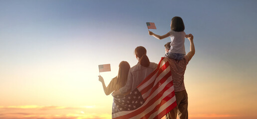 Patriotic holiday, family with American flag