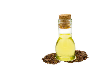 Bottle of linseed oil and linseeds isolated on white background