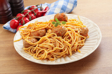 Spaghetti with meatball in tomato sause