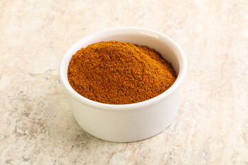 Dry Paprika powder in the bowl