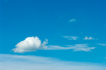 Naklejka na ściany i meble Beautiful clouds in the blue sky. Blue sky with clouds background.