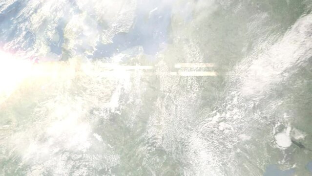 Earth zoom in from outer space to city. Zooming on Plock, Poland. The animation continues by zoom out through clouds and atmosphere into space. Images from NASA